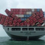 The shipping containers fall off the M/V Bai Chay Bridge container ship damaging cargo.