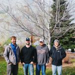 The TRG team poses outside in Bozeman during No-Shave November.