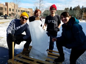 Johnny Certo, Brenda Solberg, Meredith Lambert, and Kevin Banogon are a part of the TRG Team during the Sweet Pea Festival's Ice Carving event.